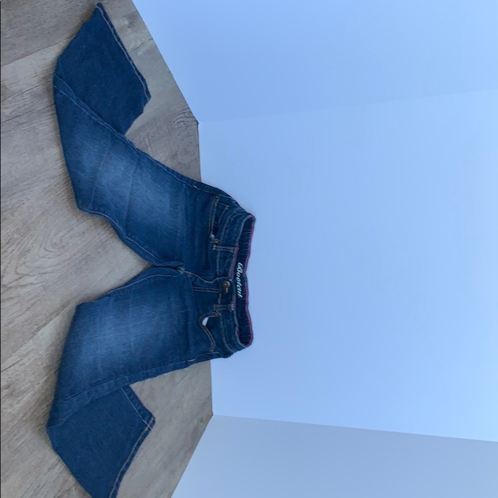 New Bootcut Jeans. Adjustable waistband & closure.